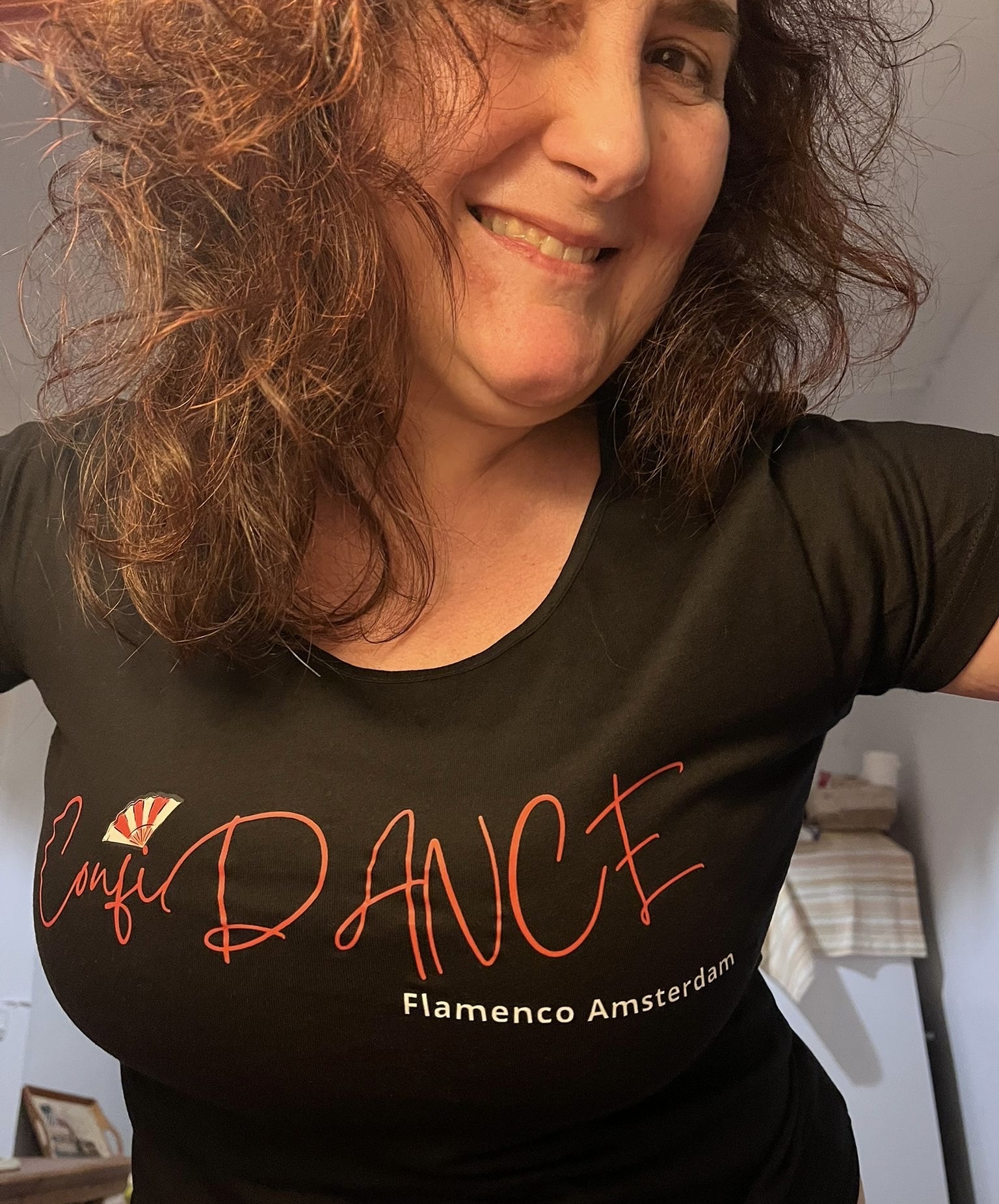 Student dancing in a Flamenco ConfiDANCE™ shirt