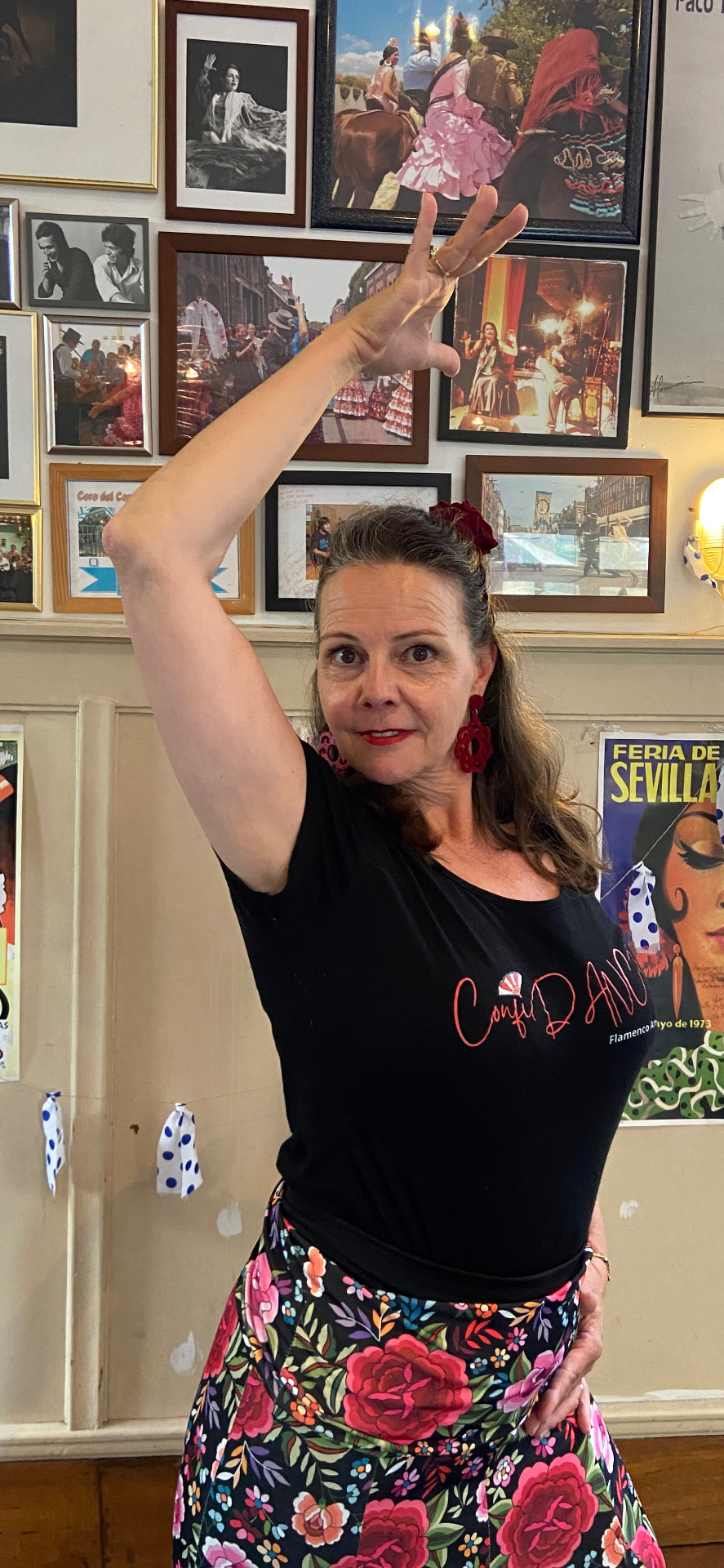 Michela posing in flamenco attire at the studio